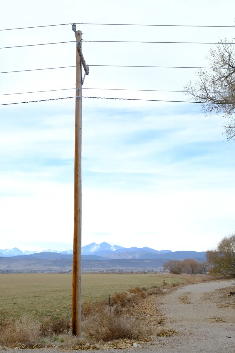 pole with mountains in distance